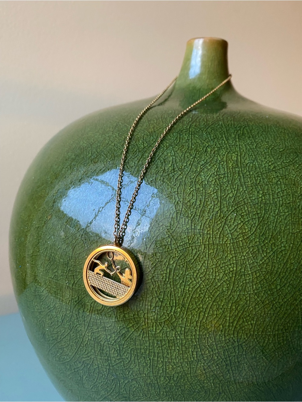 Trifari Gold Tone Necklace with Round 3D Pendant feat Tennis Match
